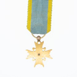 Rare médaille d’officier de l'ordre du Trésor Sacré en or et émail.