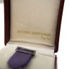 Médaille miniature des palmes académiques avec rubis.  Anneau en or poinçonné à l’aigle.