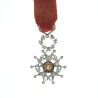 Très jolie miniature de la légion d’honneur en or, avec diamants et émeraudes.