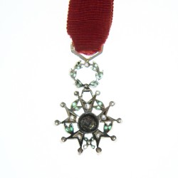 Très jolie miniature de la légion d’honneur en or, avec diamants et émeraudes.