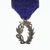 Médaille des palmes académiques.