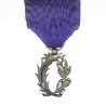 Médaille des palmes académiques.