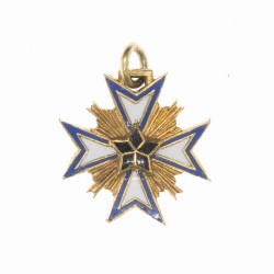 Médaille miniature de l'ordre de l’étoile noire du Benin en or et émail.