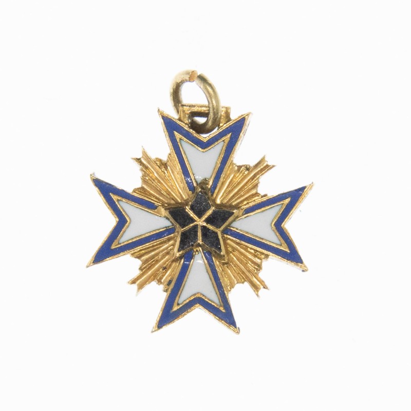 Médaille miniature de l'ordre de l’étoile noire du Benin en or et émail.