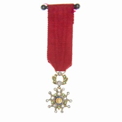 Médaille miniature de la légion d'honneur en or, diamants et émeraudes.