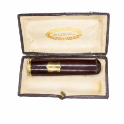 Ancien fume cigare avec bague et écu en or.