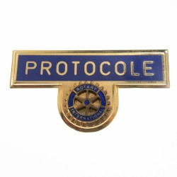 Ensemble du Rotary International composé d’une médaille au profil de Paul Harris Fellow, un insigne du protocole.