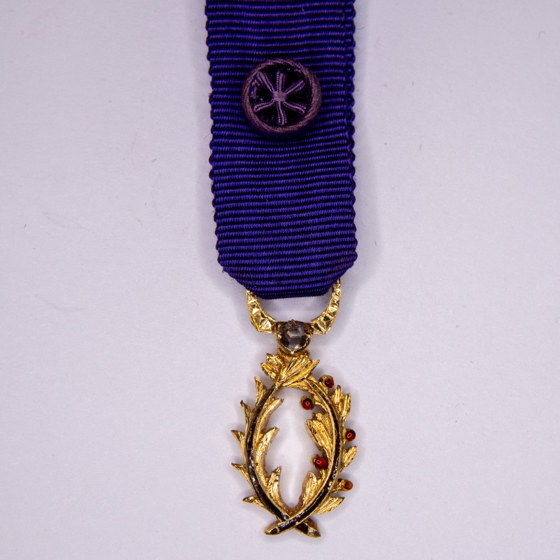 Miniature Medal of Officer of the Gold Academic Palms, set with a diamond.