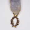 Médaille miniature d’officier des palmes académique.