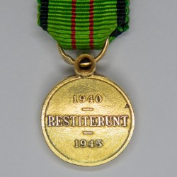 Belgique.  Médaille miniature de la résistance civile 1940-1945. En or avec un diamant.