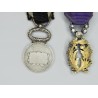 Miniature chain including a Legion of Honour medal, academic palms and mutuality medal.